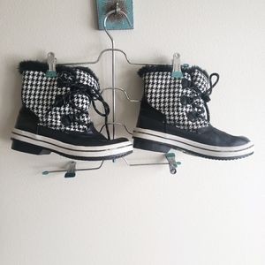 Black and white winter/rain boots